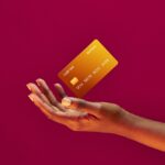 African,American,Female,Hand,And,Levitating,Template,Bank,Credit,Card